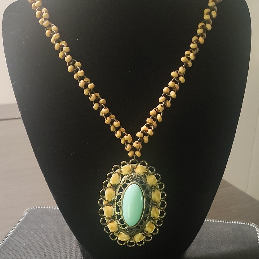 Unique Beaded Necklace with Green Pendant
